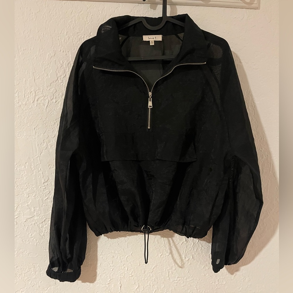 Black transparent pullover size xL but I wore and I’m a small.